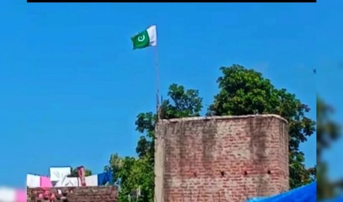 Youth Hoisted Pakistani Flag